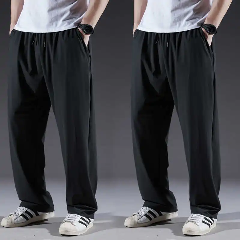 

Мужские спортивные брюки из ледяного шелка, летние тонкие эластичные свободные брюки больших размеров, прямые драпированные брюки, повседневные длинные брюки, модные брюки для отдыха...