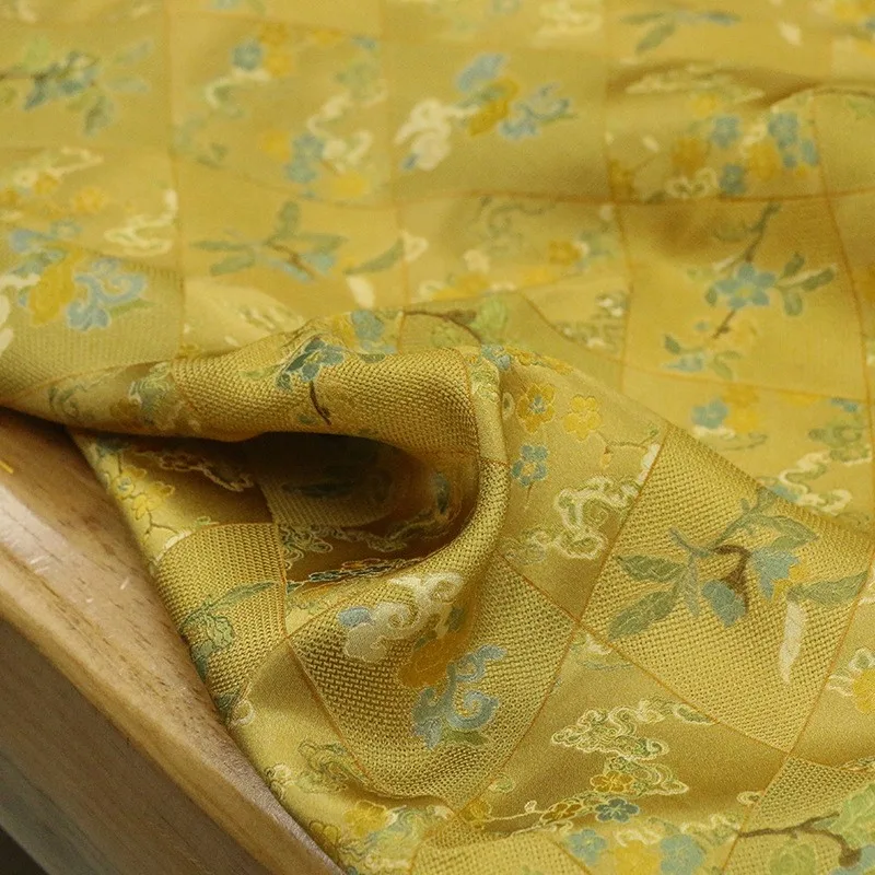 

New spring style printed yellow base silk jacquard fabric for Chinese-style cheongsam and Hanfu