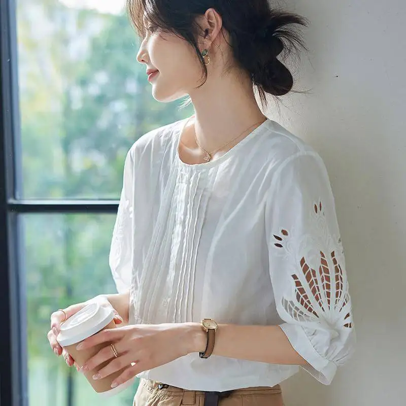 

2025 White Embroidery Hollow Out Blouses Summer Elegant Loose Casual Top Shirts Women Fashion Temperament Folds Blouse Shirts