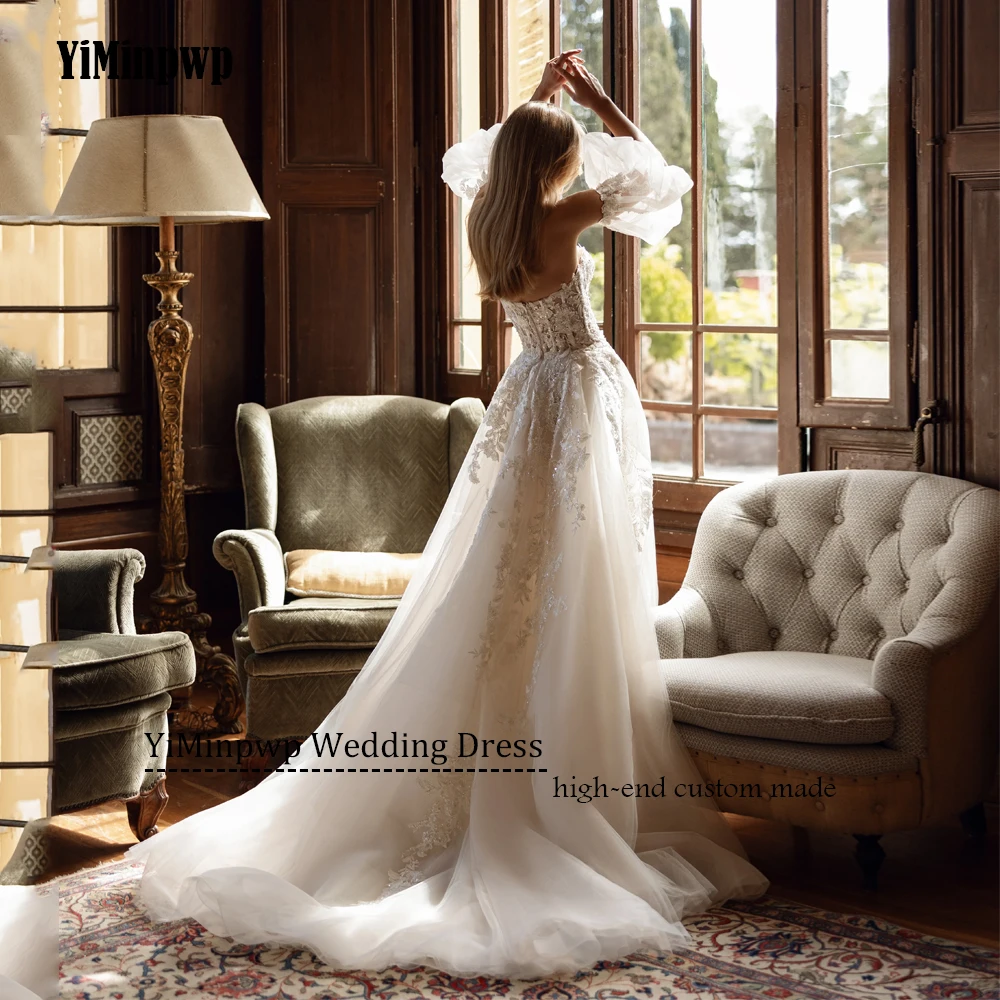 Vestidos De Novia Vintage Vestidos De Novia elegantes sin tirantes batas sin espalda Apliques De encaje Vestidos glamorosos De Novia personalizados 2025