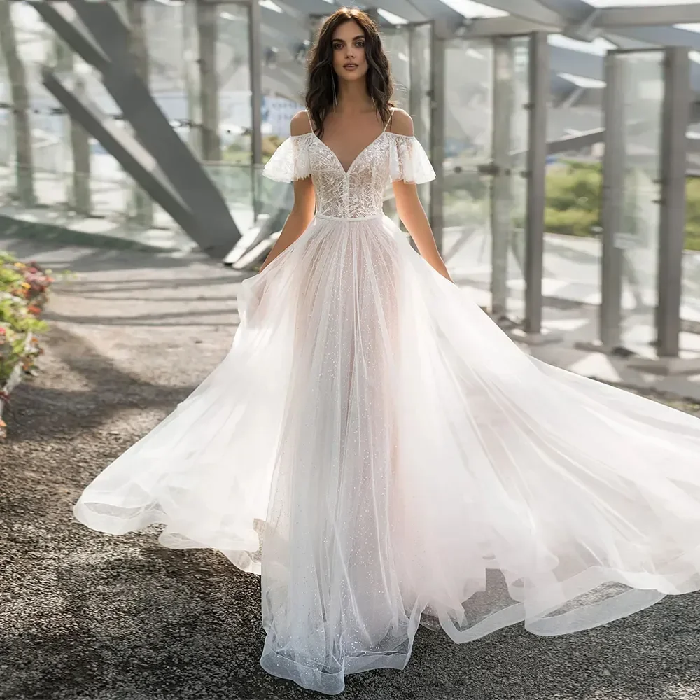 

Beautiful and charming sweetheart deep V-neck applique Italian thin shoulder halter Beach bride wedding dress Vestidos de novia