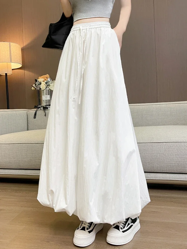 กระโปรงทรงเอไลน์ลายดอกไม้หวานๆ เอวยางยืดสูง รุ่นใหม่สำหรับฤดูร้อน กระโปรงยาวเรียบง่าย สไตล์อเนกประสงค์ ทรงกระโปรงทรงโคมไฟ