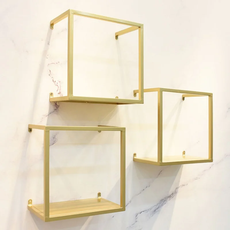 Custom, fashion retail shoe handbag shop fit out design fittings gold metal wall-mounted shoes bag display rack