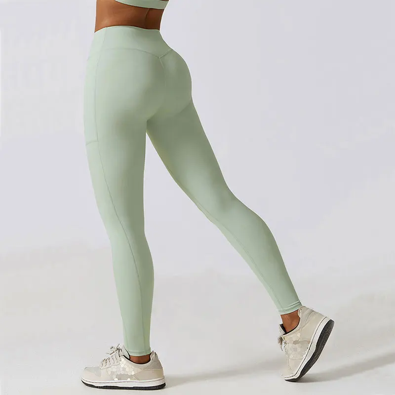 Jednolite legginsy damskie miękkie spodnie treningowe stroje Fitness spodnie do jogi z wysokim stanem stroje gimnastyczne Spandex legginsy Push Up