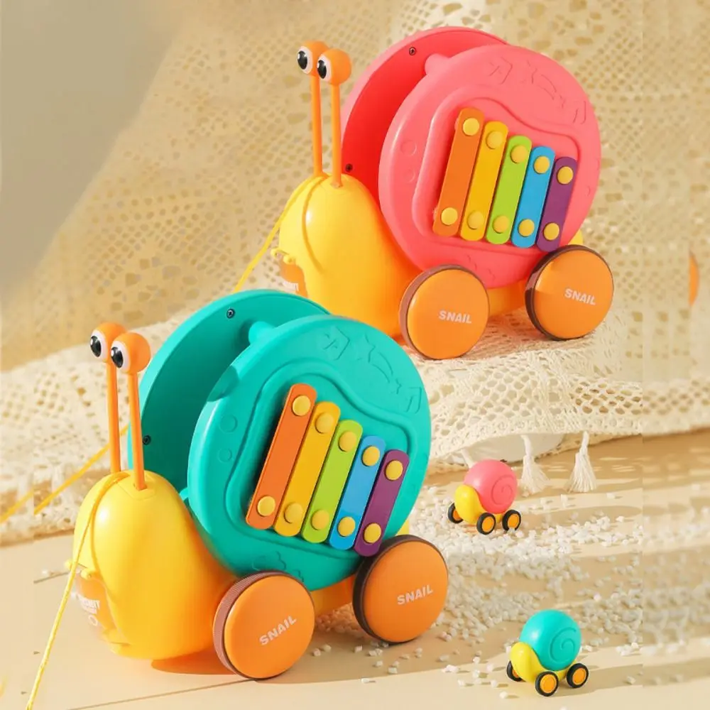 

Baby Walker Pull String Snail Car Toy Learning To Walk with Music Drag Rope Snail Interactive Knock Pull-Along Snail Toy