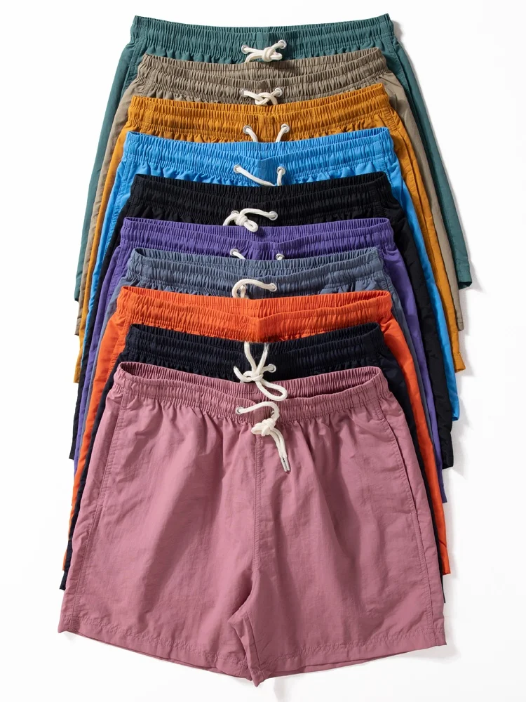 

Мужские летние легкие быстросохнущие дышащие пляжные шорты свободного кроя длиной пять дюймов из модной водонепроницаемой нейлоновой ткани