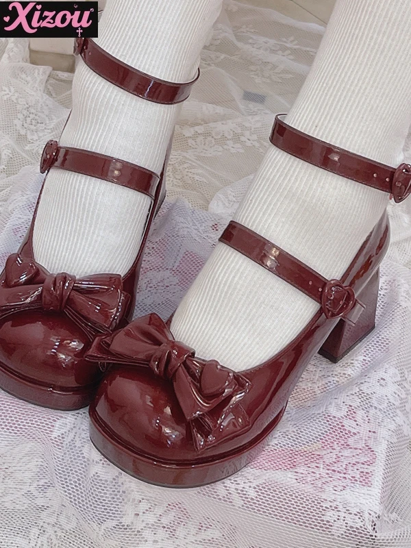 Originale giapponese dolce e carino Lolita Bow Love tacchi alti spessi ragazza morbida testa tonda Mary Jane scarpe singole per ragazza in pelle Pu