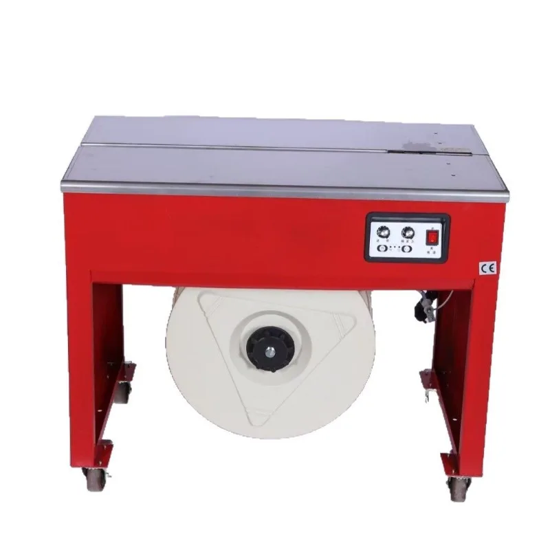 

Semi-automatic strapping machine with programmable controller and engine for food packaging carton cans and glass bottles