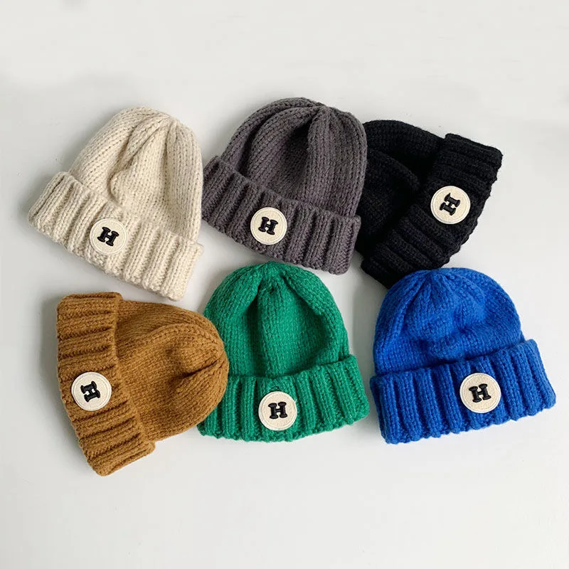 

Baby children's autumn and winter Baotou hat boy's woolen hat girl's letter Korean version Western-style warm knitted hat