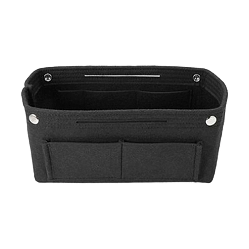 

Сделано с фетровой косметичкой. Прочное и стильное решение для хранения. Широкая сумка-вставка из фетра.