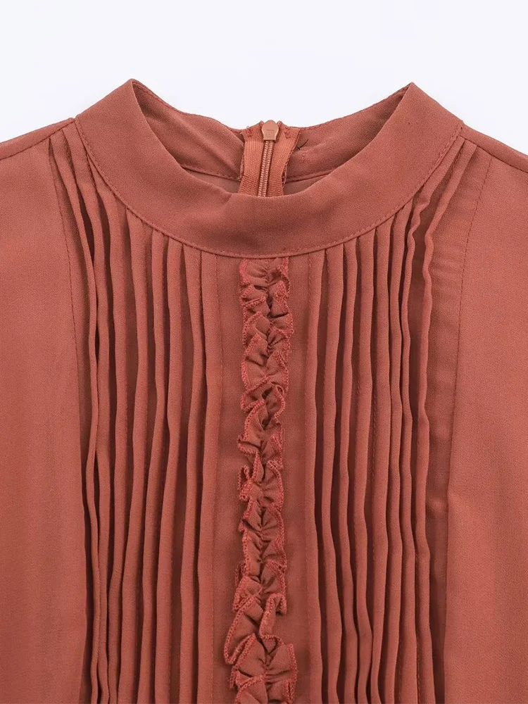 New European-style women's dress, fashionable and versatile, featuring an elegant design with ruffled details and long sleeves.