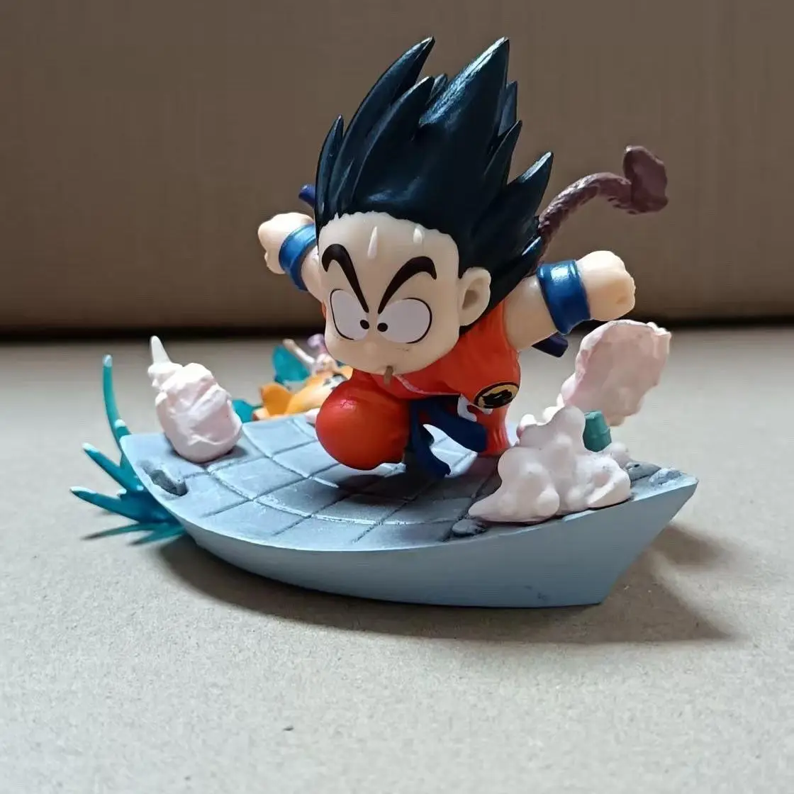 

Dragon Ball Kid Goku Anime Action Figure PVC Collectible Son Goku Eating Mouse Statue Gift for Fans of Anime Toys Model