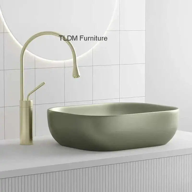 

Simple Ceramic Sinks for Toilets Nordic High-end Deep Above-the-counter Basin Luxury Oval Designer Bathroom Sink for Balcony