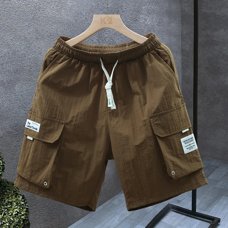 

Летние мужские шорты из ледяного шелка, повседневные, модные, в корейском стиле, длиной до колена, для молодежи, для активного отдыха, удобные, дышащие, из полиэстера.