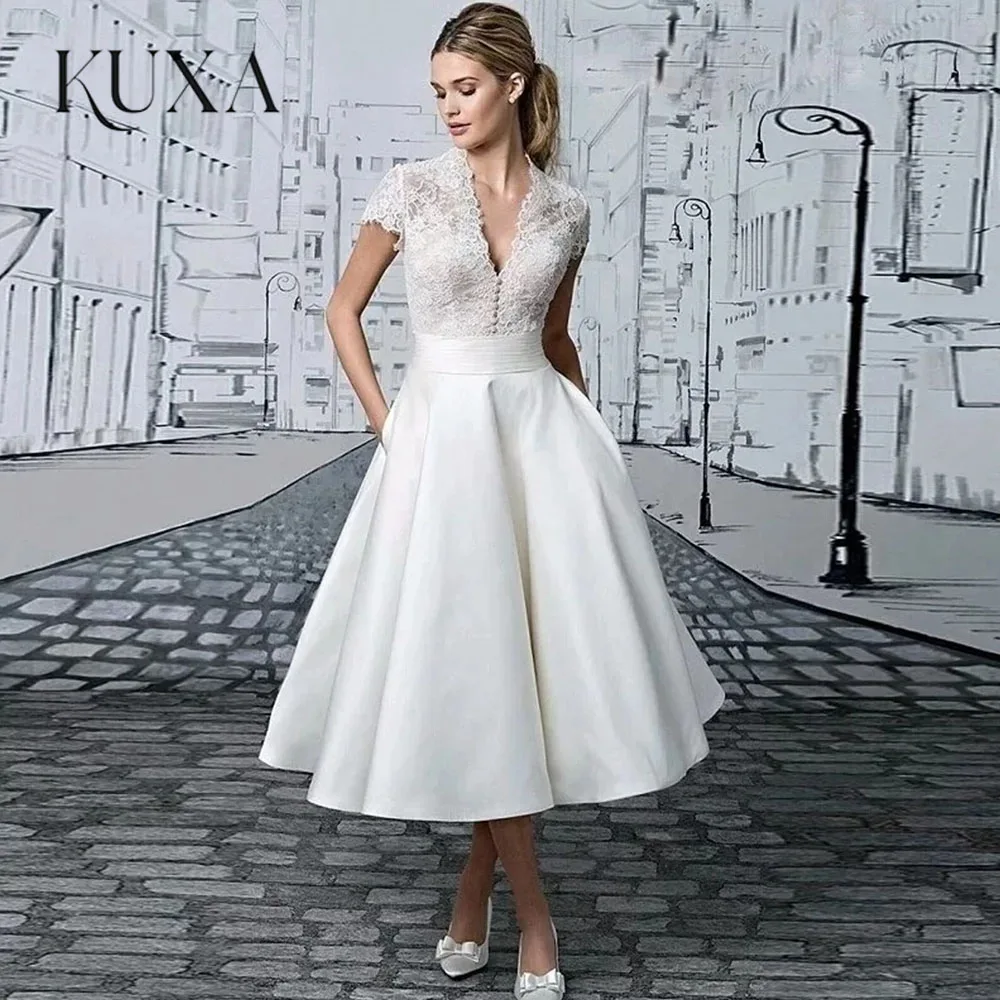 KUXA Customized Princess Short Wedding Dresses  Tea-Length Cap Sleeves V-Neck Lace Button Elegant A-Line Satin Bridal Gowns 2026