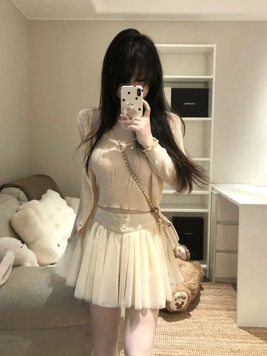 Женский комплект из трех предметов лета 2025 Pure Desire Sweet Spicy Girl, вязаный кардиган с вырезами, жилет на бретелях, юбка с высокой талией