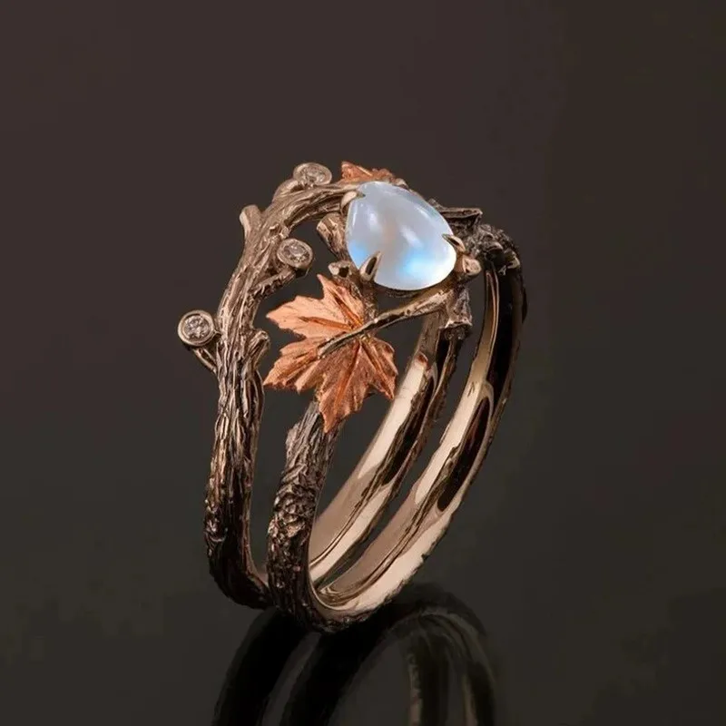 Anillo Vintage bohemio de piedra lunar con hoja hueca para mujer, diseño de nicho, anillos étnicos de moda, regalos de joyería para vocación
