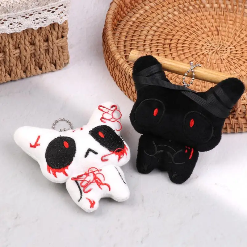 1 paio di portachiavi in peluche fantasma rotto ferito bianco nero Halloween Cartoon bambola di pezza portachiavi ciondolo borsa decorazione di coppia