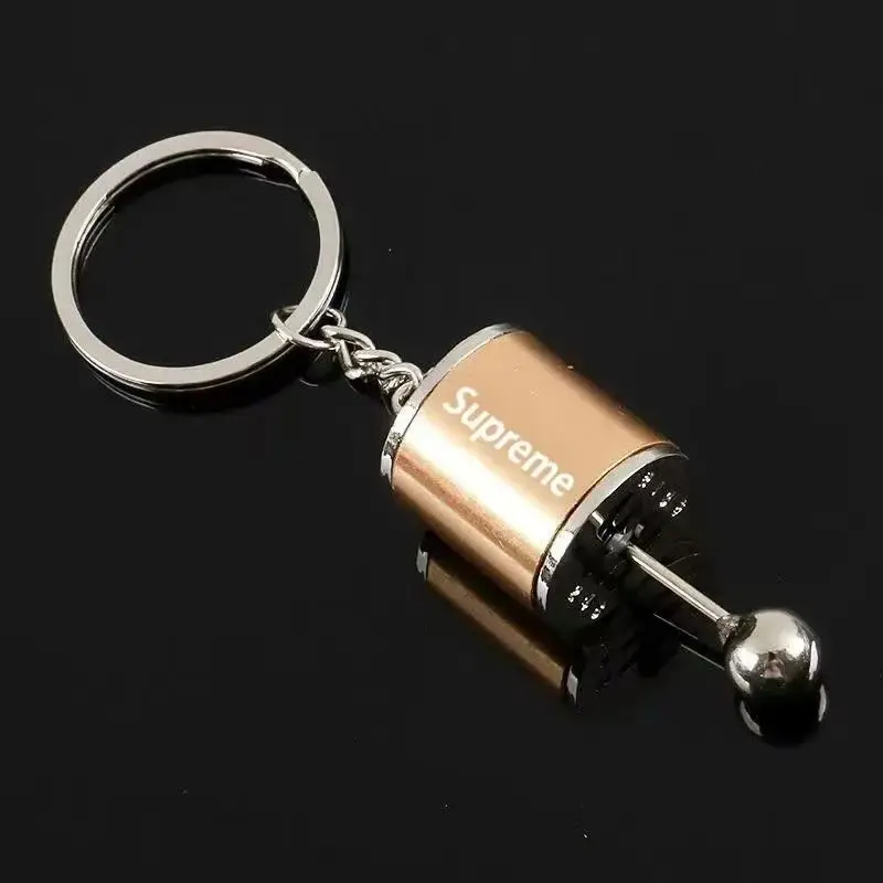 Mini turbocompresseur Style voiture porte-clés Transmission d'engrenage pendentif porte-clés presse-bas porte-clés métal jouet Fidget Spinner jouet