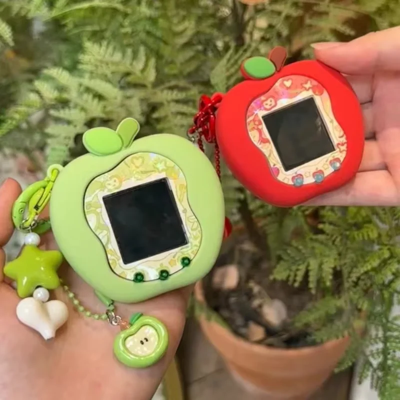 

Электронный питомец Tamagotchi Uni с силиконовым защитным чехлом в красно-зеленом яблоке и клубничном дизайне, новая игрушка на складе