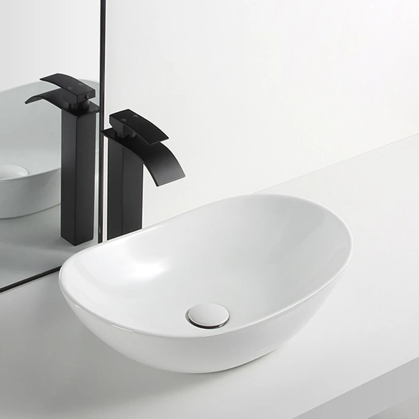 

Countertop Basin Ceramic Sinks Toilet Hand Wash Basin Oval Washbasin Balcony Countertop Sinks With Drainer 520*335*150mm