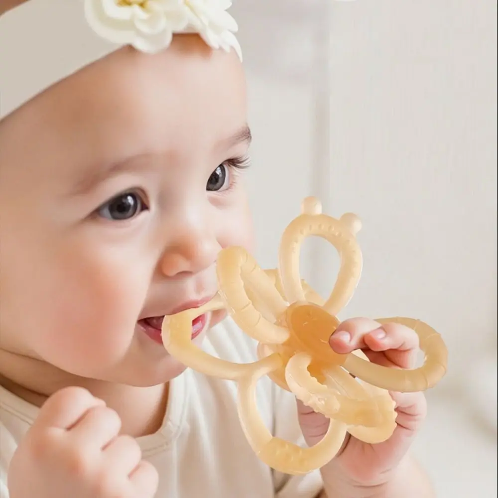 

Silicone Kids Teether Toy Infant Grab Shake Developmental Baby Rattle Toy Flower Shape Soft Teething Ring Sensory Toys