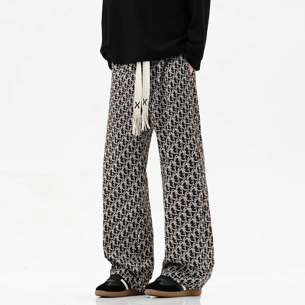 

In 2025, the new Spring and autumn casual pants and Hong Kong-style loose sportswear pants are fully printed with graffiti