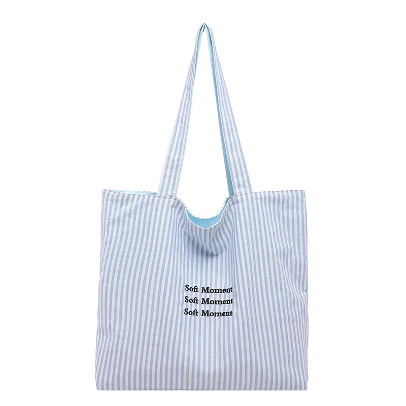 

Korean-style casual double-sided striped canvas bag for women, new large-capacity versatile shoulder tote bag, simple commuter b