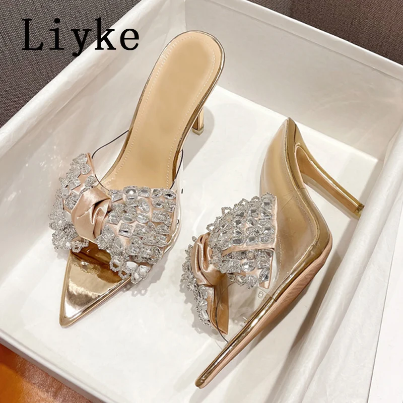 Liyke Thin High Heels Women Slippers Fashion Crystal Bowknot PVC Transparent Sandals Sexy Pointed Toe Summer Party Prom Shoes