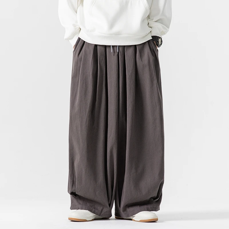 Celana Kaki Lebar Pria Ukuran Besar Celana Panjang Jogger Pinggang Elastis Celana Harem Kasual Pria Celana Olahraga Pria Fashion Longgar Ukuran Besar 5XL