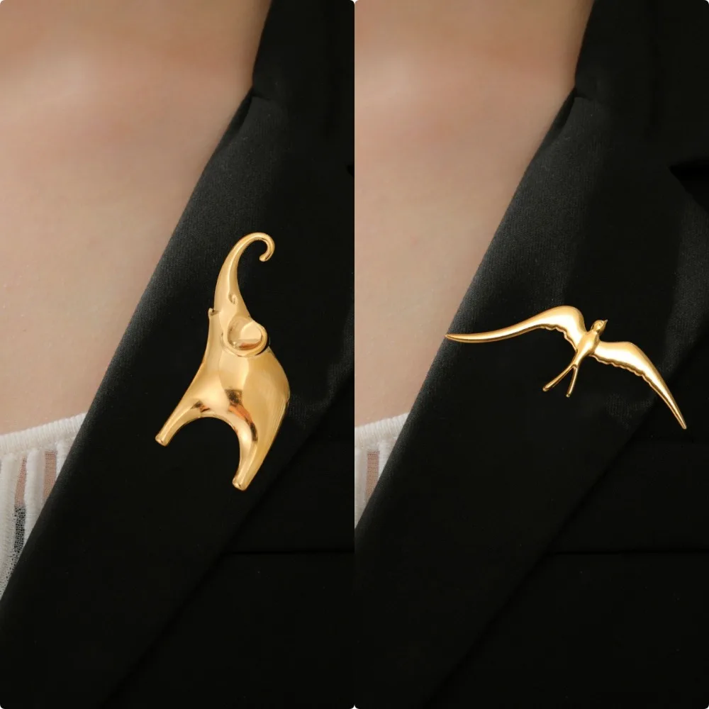 Broches de animales de acero inoxidable con diseño de elefante y golondrina de Metal liso Simple con personalidad para mujeres y hombres, accesorios de joyería para decorar ropa