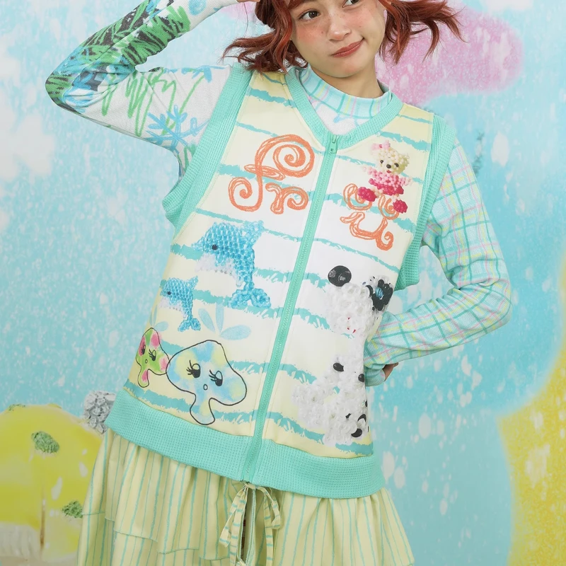 日本の女性の服春と秋のオリジナルデザインのドレス漫画の印刷スプライシングニット黄緑の弓ベストドレス