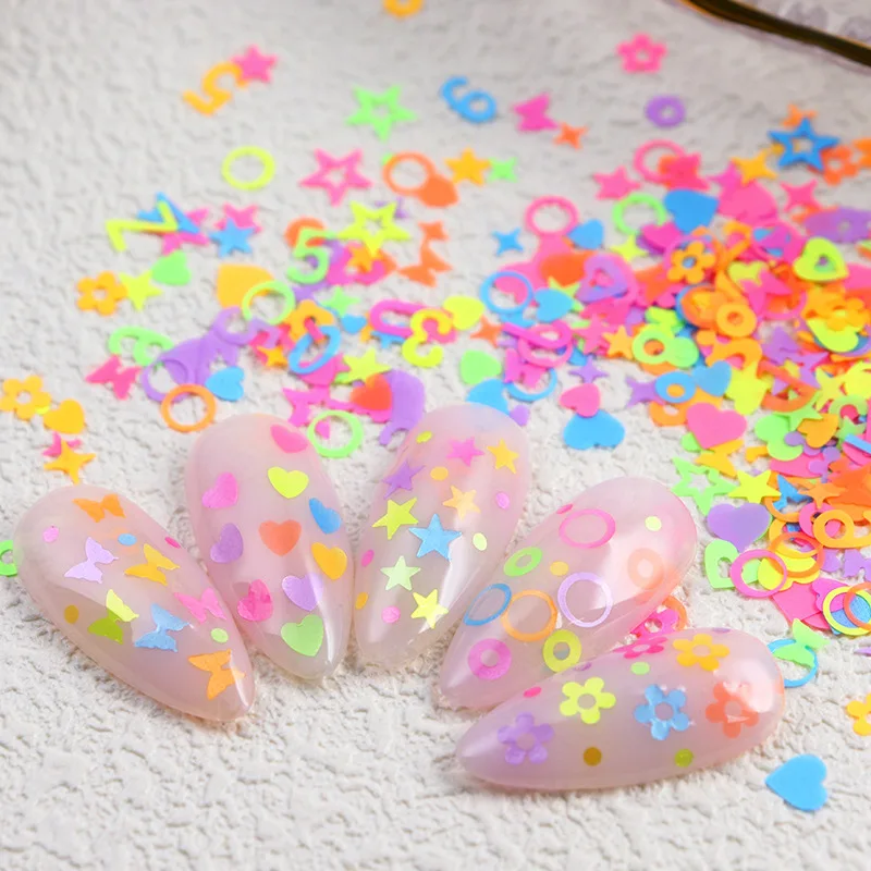 12 griglie stella fluorescente cuore lettere resina paillettes per unghie resina epossidica scava fuori stella rotonda fette per unghie lavoro manuale materiale paillettes fai da te