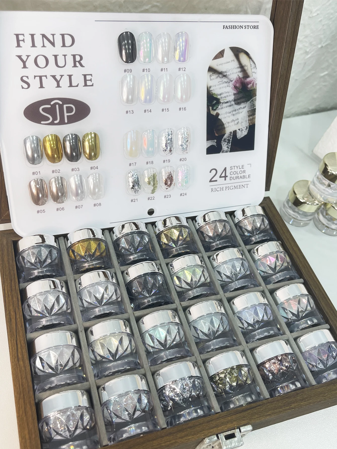 24-color nail polish magic mirror powder set with storage box, color cards, aurora nail polish powder, and gold foil powder.