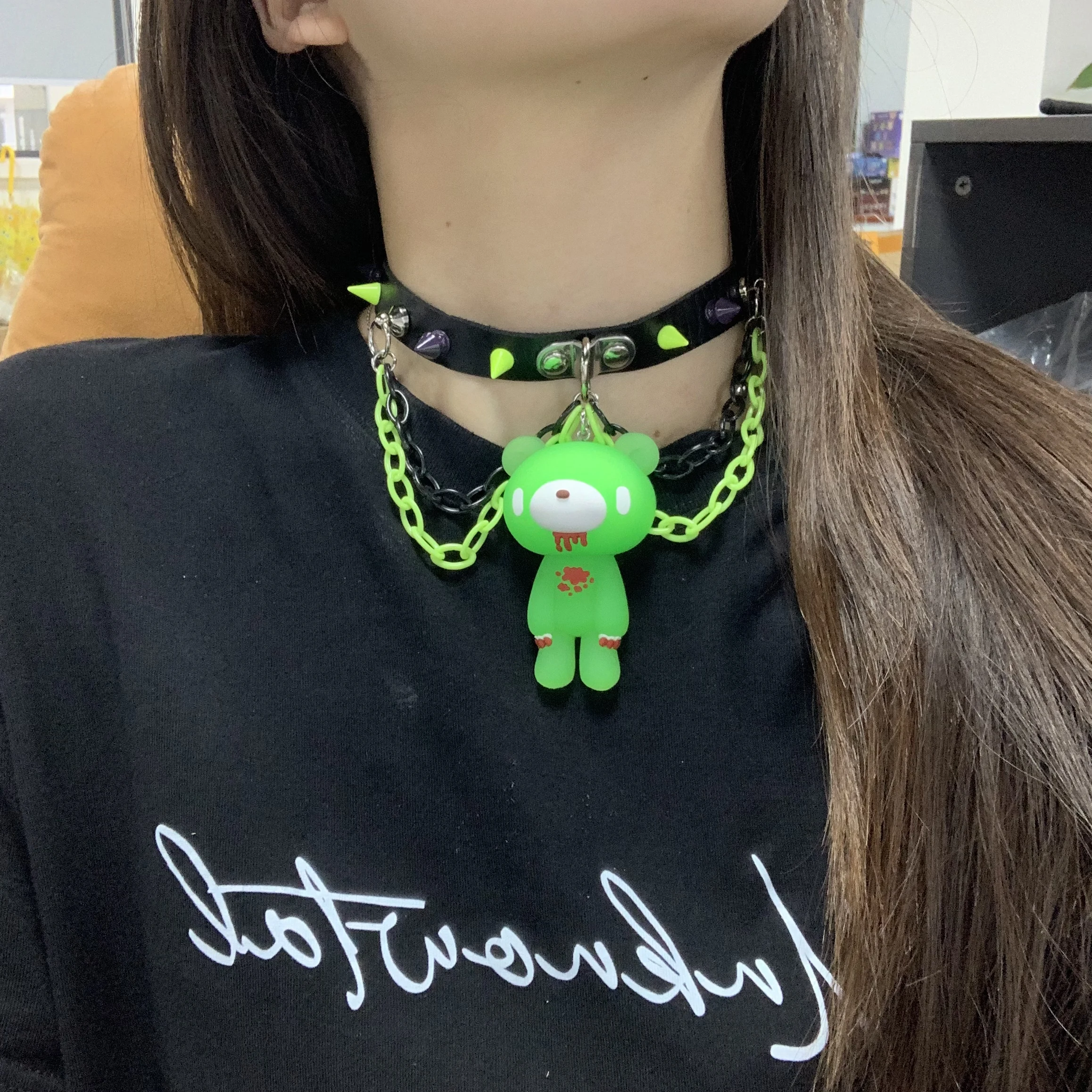 Edgy choker with neon green spikes, chains, and a cute 