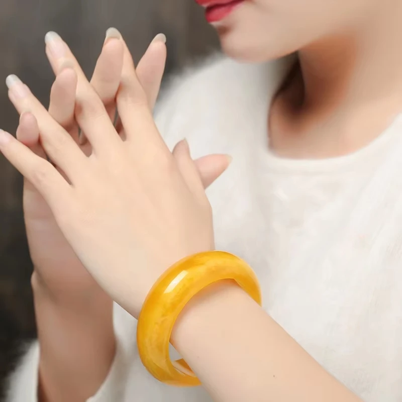 

Baltic amber beeswax chicken oil yellow bracelet for women widened and thickened amber bracelet bangle bangles for women