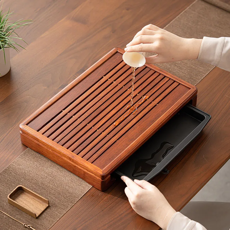 

Бытовой чайный сервиз кунг-фу из цельного дерева: небольшой прямоугольный поднос для чая из палисандра, бамбуковый чайный столик, хранилище воды и тип ящика