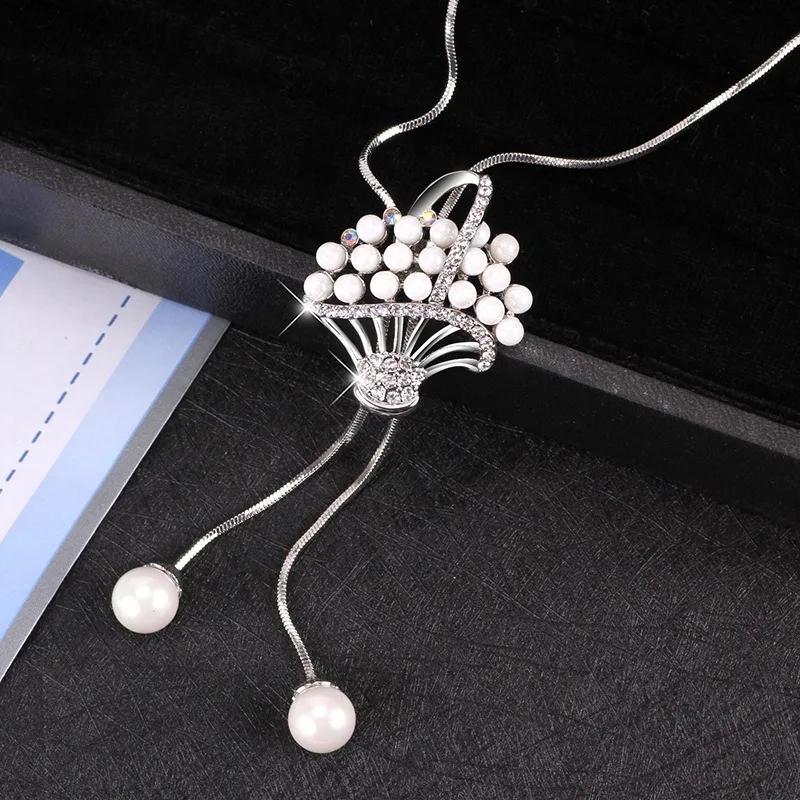 

New long and versatile tassel necklaces and flower basket sweater chains for autumn and winter