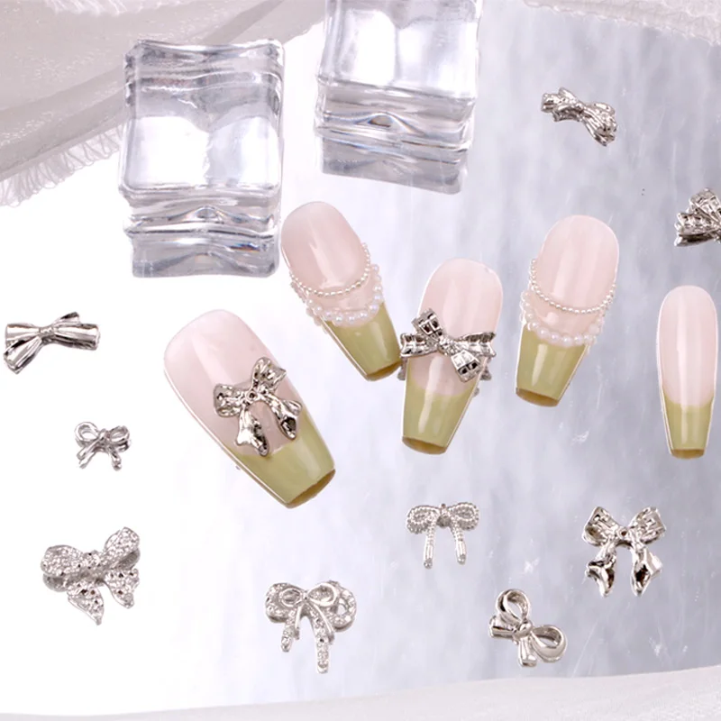 TSZS-Prata Bowknot Fita Nail Art Encantos Jóias, Bowknot 3D, cinza Rhinestones, 3D Bow Shaped Liga Decoração prego, 10pcs