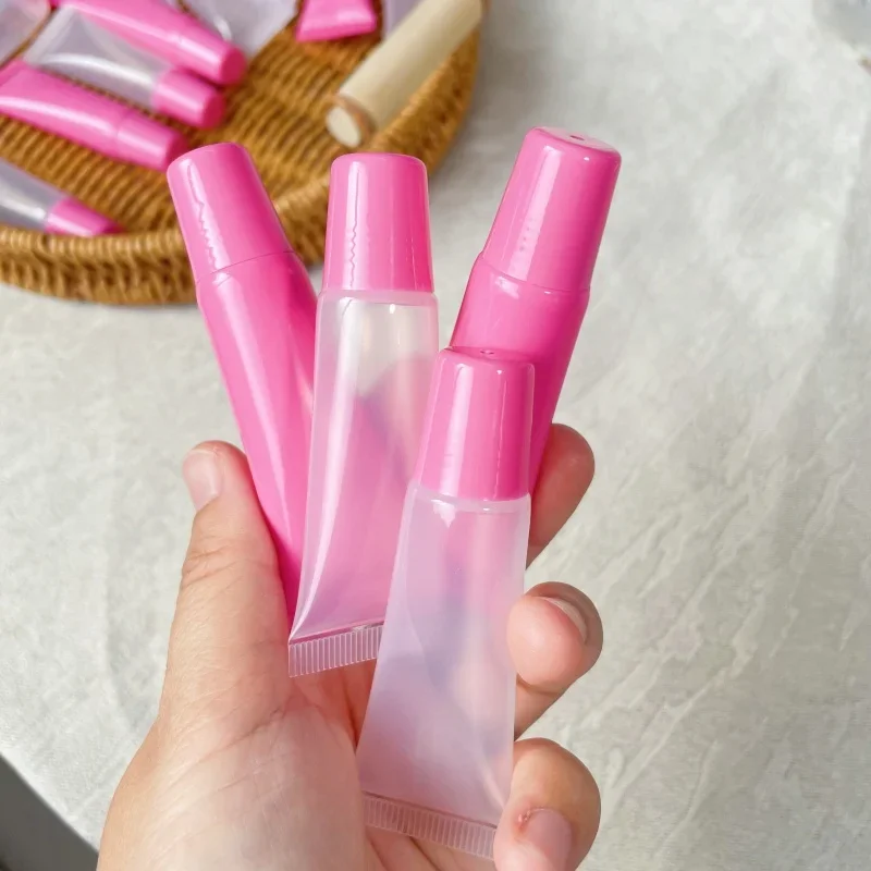 50 個 10 ミリリットル口紅メイクアップサブパッケージピンク蓋チューブ空のチューブ押し出しリップグロスリップカラー斜め口