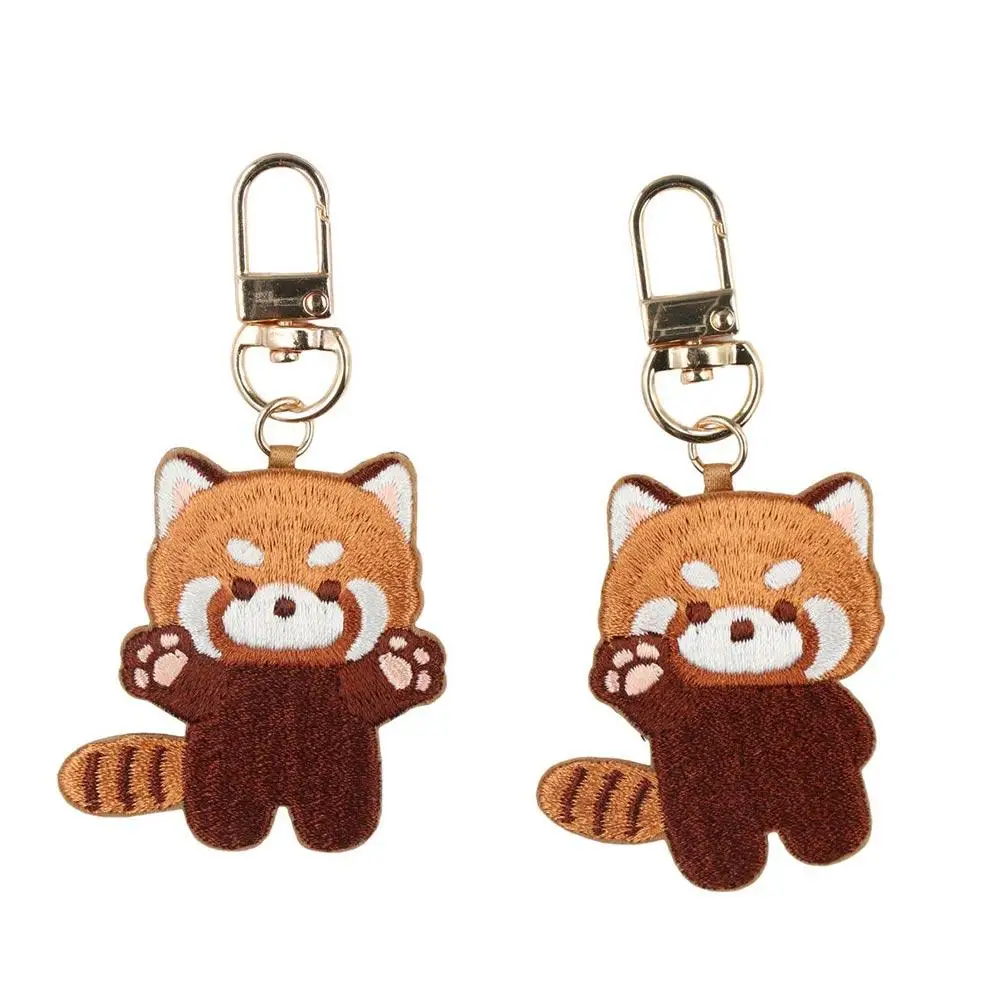 Divertente cartone animato panda rosso portachiavi moda creativa ciondolo animale kawaii lecca-lecca morbida panda rosso ricamo ciondolo regalo dello zoo