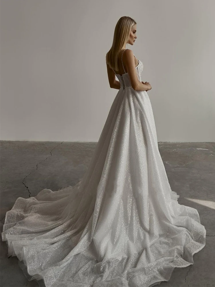 Pearl Embellished A Line Wedding Dress with Delicate Spaghetti Straps and Sparkling Bling Bling Bridal Gowns