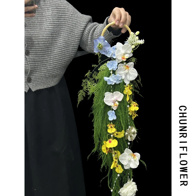 

Advanced sense of Phalaenopsis dopamine color simulation flower bouquet wedding dress shooting hand bouquet photo props hand flo