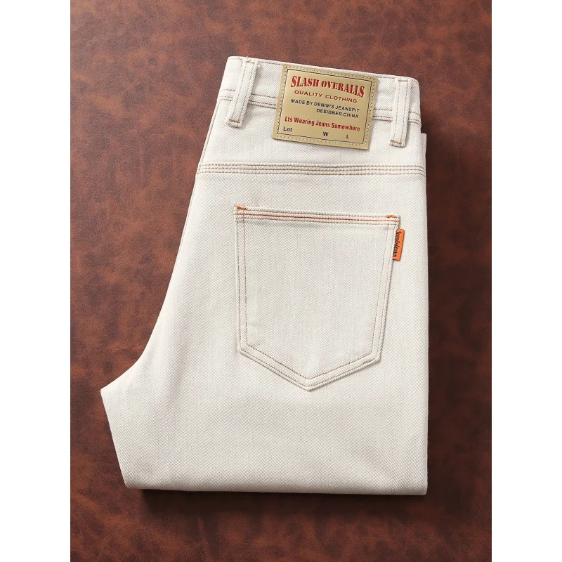 Jeans bianchi alla moda da uomo stile autunnale semplice moda casual abbigliamento da uomo slim fit piccoli pantaloni di lusso leggeri a tubo dritto