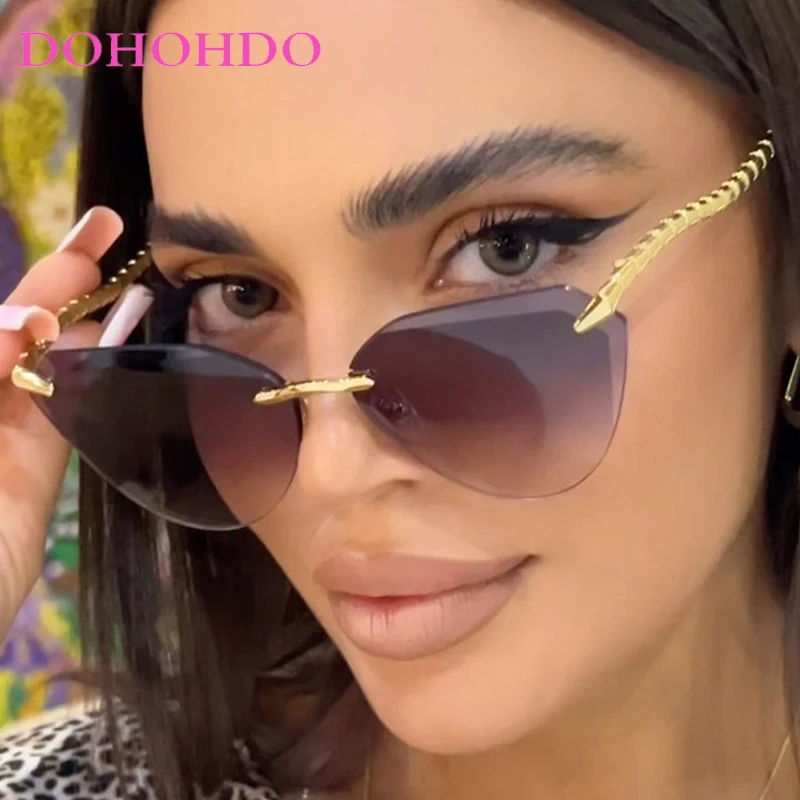 

Fashion Frameless Cat Eye Women Sunglasses 2025 Luxury Brand Design Metal Frame Men Sunglass Outdoor Travel Eyewear Ladies UV400