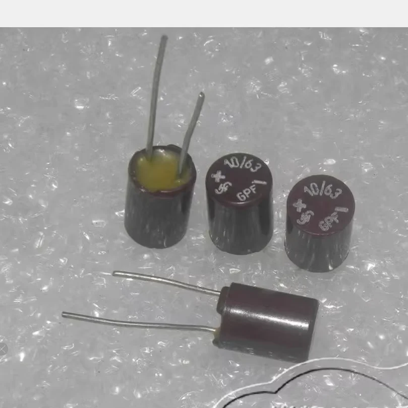 2PCS/LOT The Old West German ROE Siemens GPF 63v10uF 50V Antique Pig Blood Cake Bakelite Shell Electrolytic Capacitor