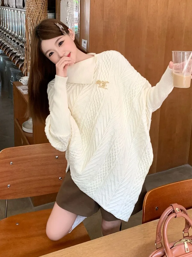 Autunno e inverno Nuovo design coreano Collo alto irregolare Torsioni di pasta fritta Mantello Maglieria Celebrity Street Maglione a maniche lunghe