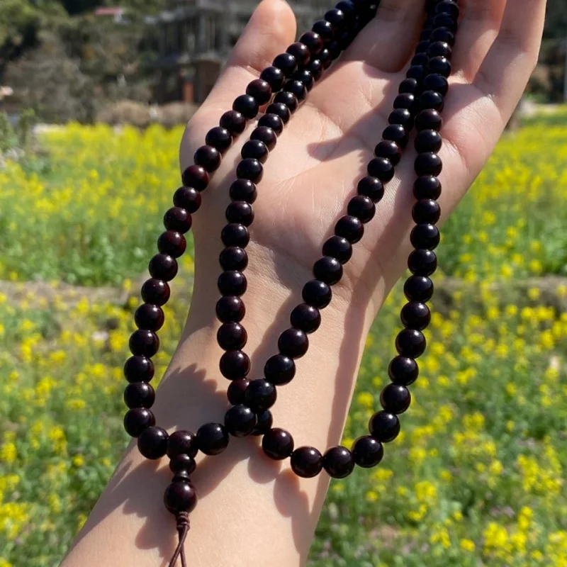 

Индийский буддийский четок из палисандра с мелкими листьями, 0,8 мм, старый материал, высокое содержание масла, высокая плотность, 108 бусин, унисекс.