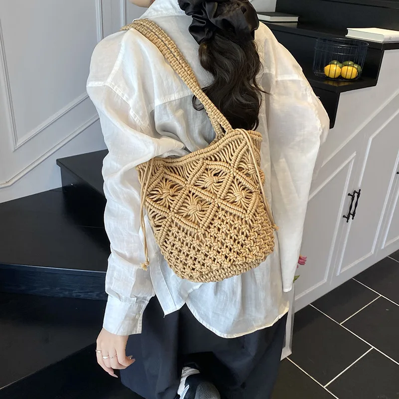 

​​2025 New Women's Hollow Shoulder Bag - Niche Woven Straw Bucket Bag, Trendy & Breathable Summer Fashion​​