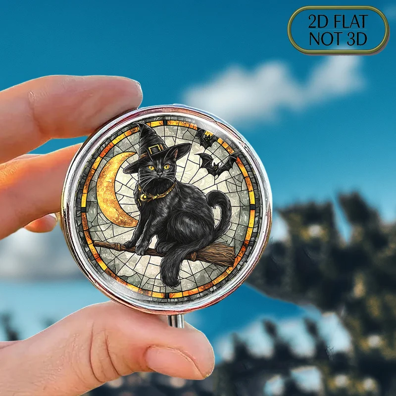 Single-piece flat, portable, round metal pill box, decorated with Halloween-themed patterns: a black cat riding a broom with a wizard's hat and a moon design, suitable for storing commonly used medicines, vitamins, or small items, making it a perfect gift for friends and relatives on holidays like Independence Day, with a flat design